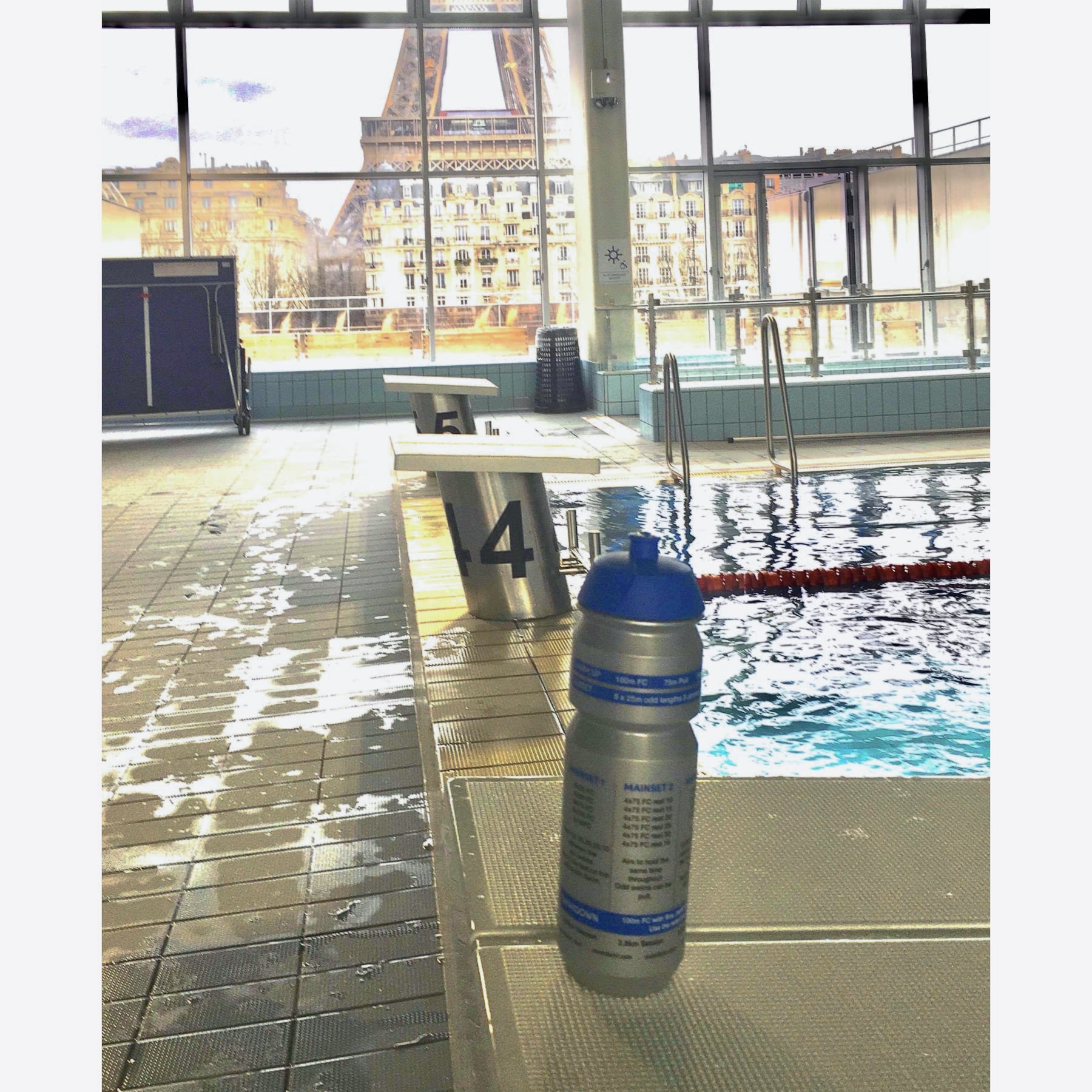 Swim for Tri - Session in a Bottle Training plan water bottle on pool side